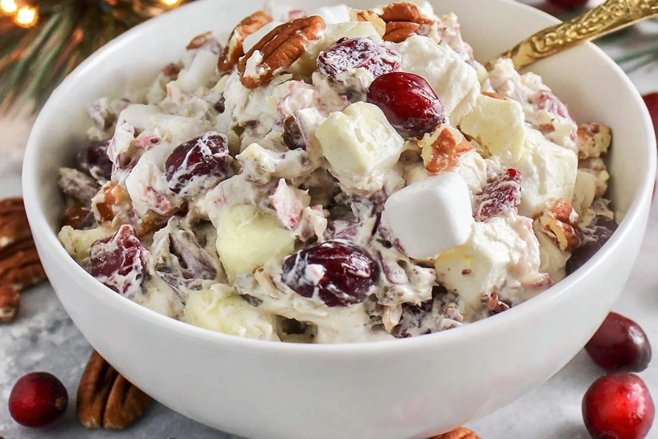 Cranberry Ambrosia Salad with fresh fruits and whipped cream