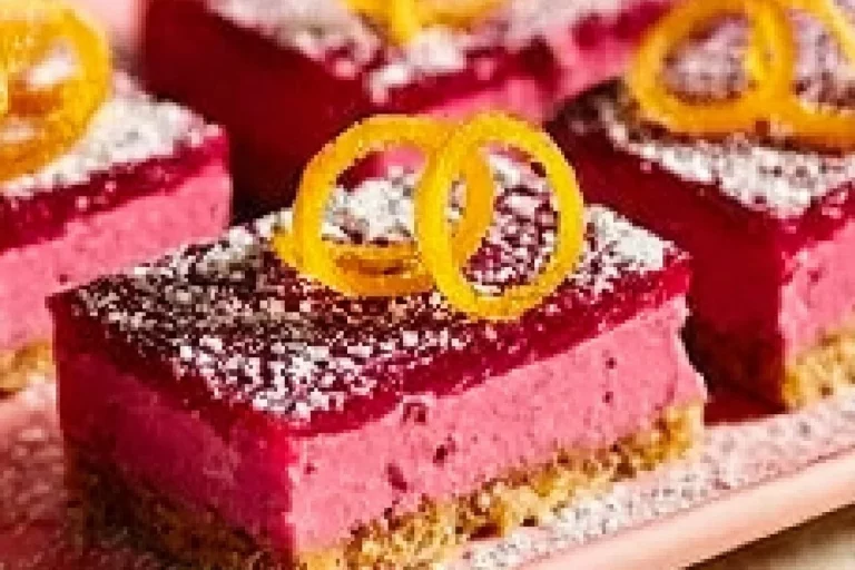 Cranberry curd bars with walnut shortbread crust served on a plate
