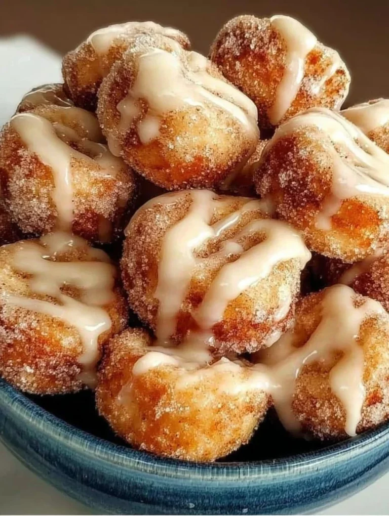 Delicious cinnamon sugar biscuit bites garnished with a sprinkle of cinnamon.