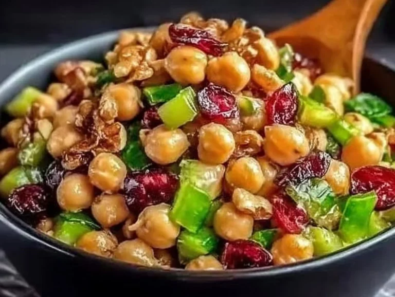Cranberry Walnut Chickpea Salad with vibrant orange vinaigrette dressing