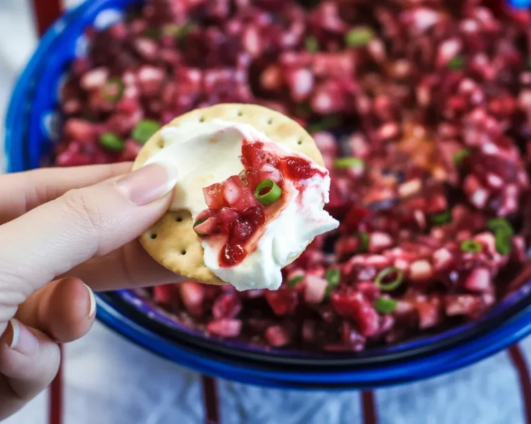 Sweet and Spicy Cranberry Cream Cheese Spread served as a festive appetizer.