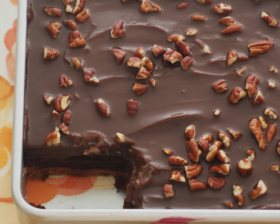 Retro Chocolate Sheet Cake in small pan topped with fudge icing