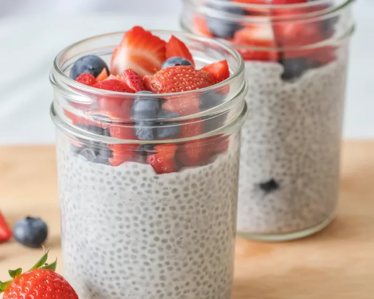 Creamy Chia Pudding with Almond Milk topped with fresh fruits and nuts