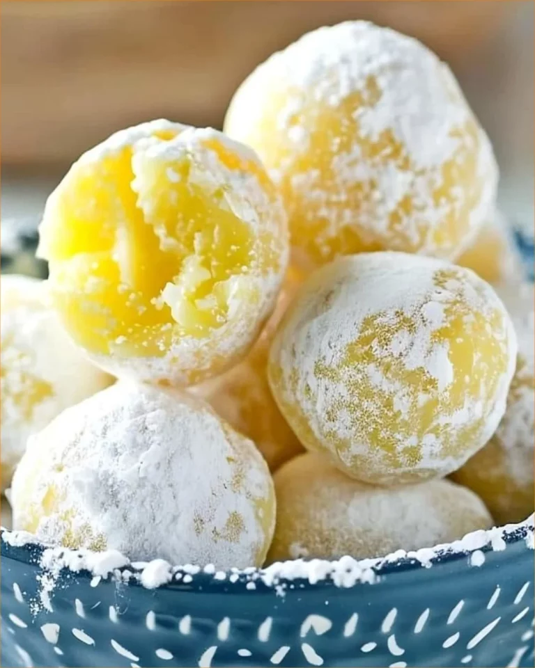 Homemade white chocolate lemon truffles on a decorative plate