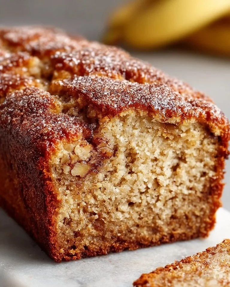 Freshly baked snickerdoodle banana bread with cinnamon sugar topping