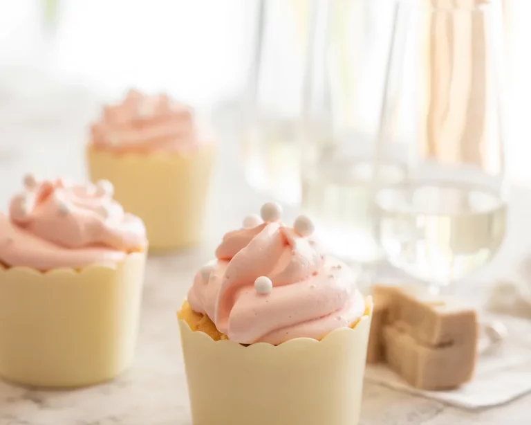 Delicious tiny vanilla bean cupcakes topped with creamy buttercream frosting.