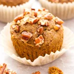 Flourless Pumpkin Spice Muffins topped with maple glaze, vegan and gluten-free.