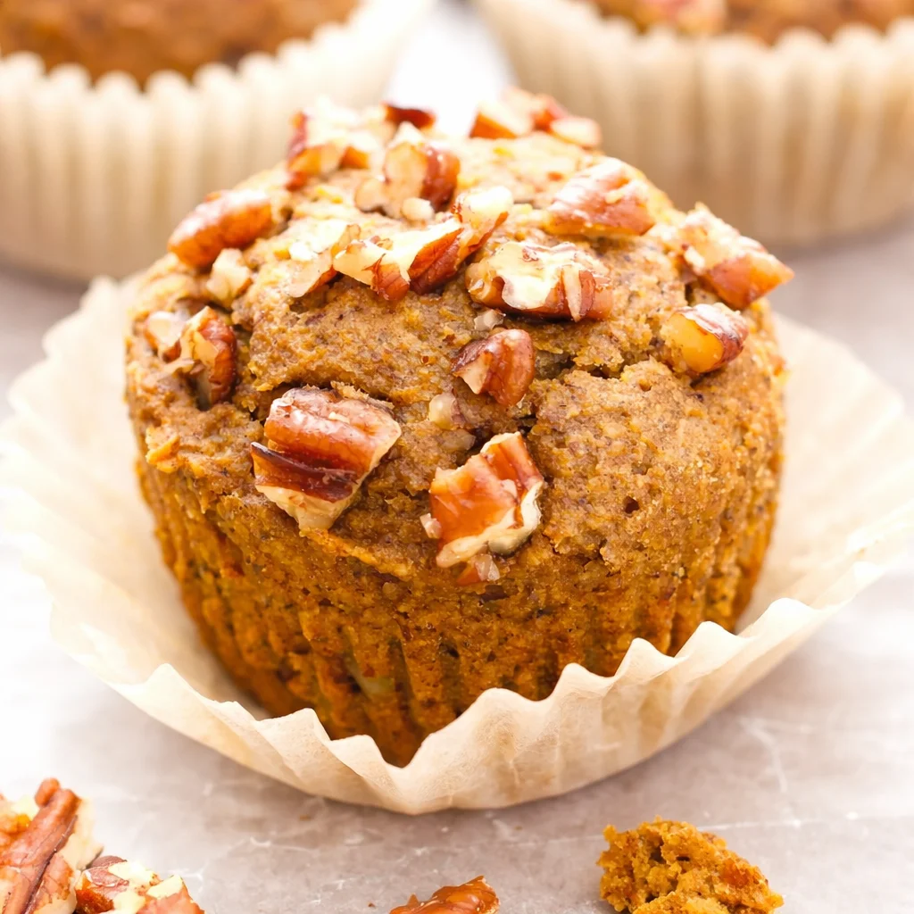Flourless Pumpkin Spice Muffins topped with maple glaze, vegan and gluten-free.