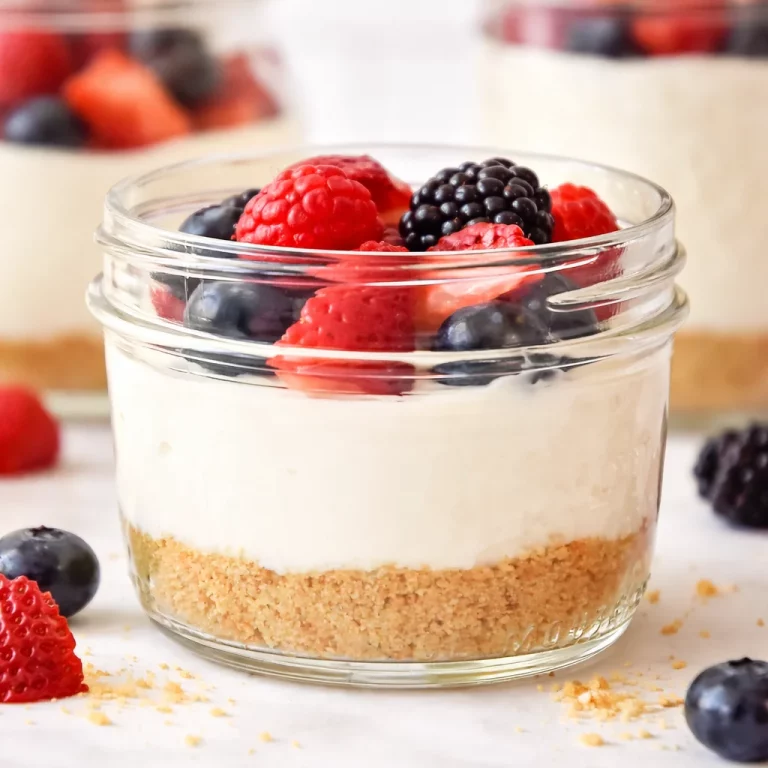 Delicious no-bake Greek yogurt cheesecake cups with a graham cracker crust.