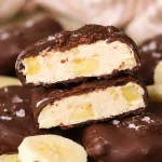 Frozen Chocolate Covered Banana Yogurt Clusters made with ripe bananas and Greek yogurt.
