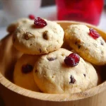 Homemade cranberry cookie fresh from the oven, perfect for snacking.