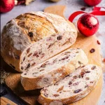 Freshly baked Cranberry Walnut Bread with walnuts and cranberries