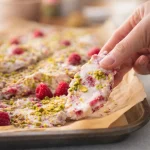 Frozen Strawberry Yogurt Bark with Pistachio, a healthy snack with creamy yogurt and fresh fruit.