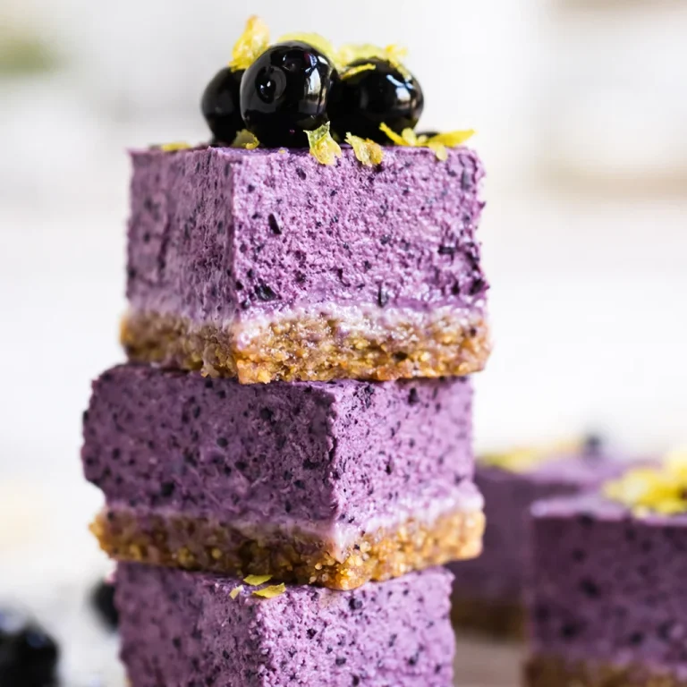 No-Bake Lemon Berry Yogurt Squares topped with fresh berries and lemon zest.