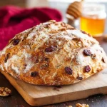 No-knead cranberry walnut bread with honey fresh out of the oven