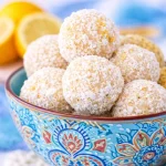 Healthy Lemon Coconut Protein Truffles made with lemon zest and coconut flour.